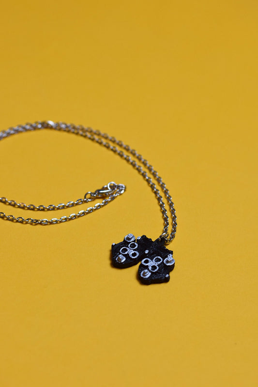 Phoropter pendant necklace